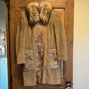 Carolina Herrera knee length coat with fur collar.